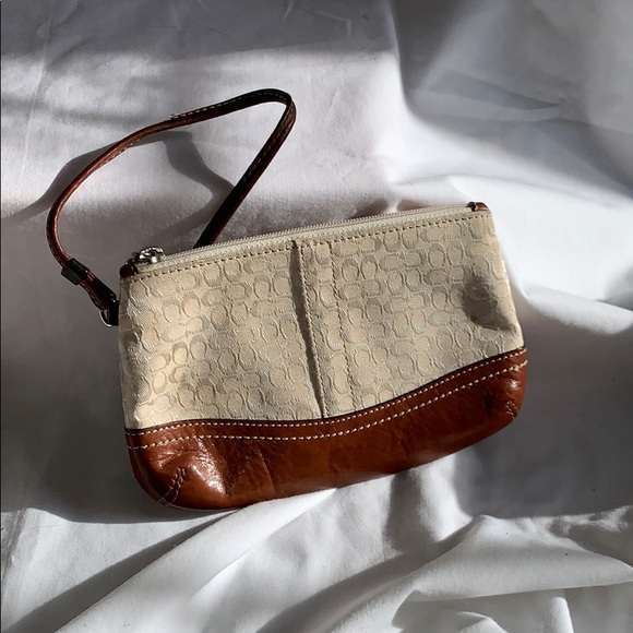 Coach Handbags - COACH wristlet white and brown